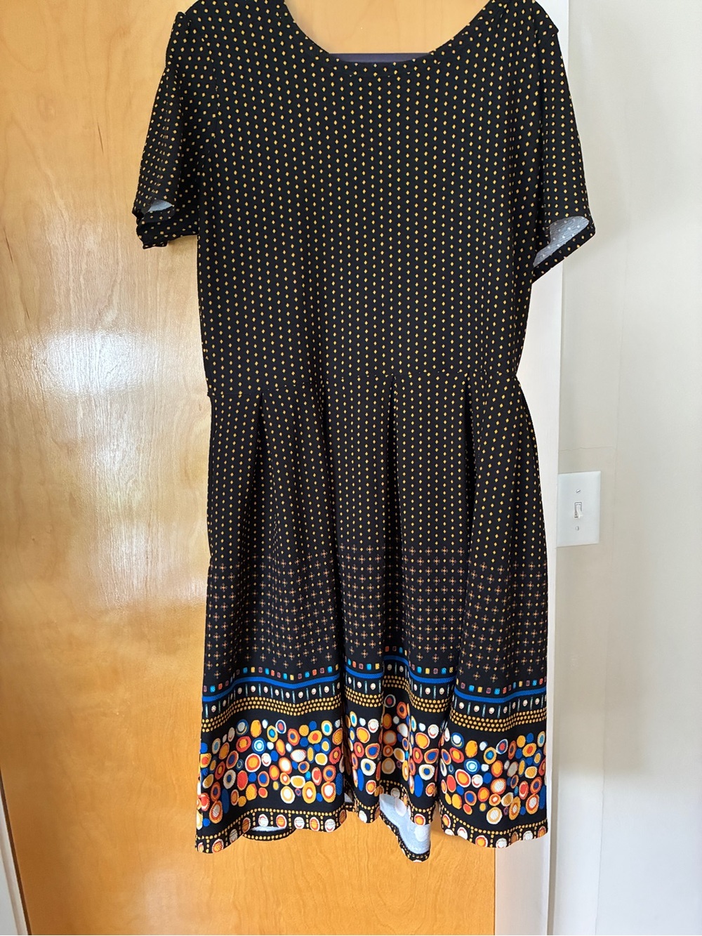 LuLaRoe Black Dress with Gold Dot Print and Colorful Hem